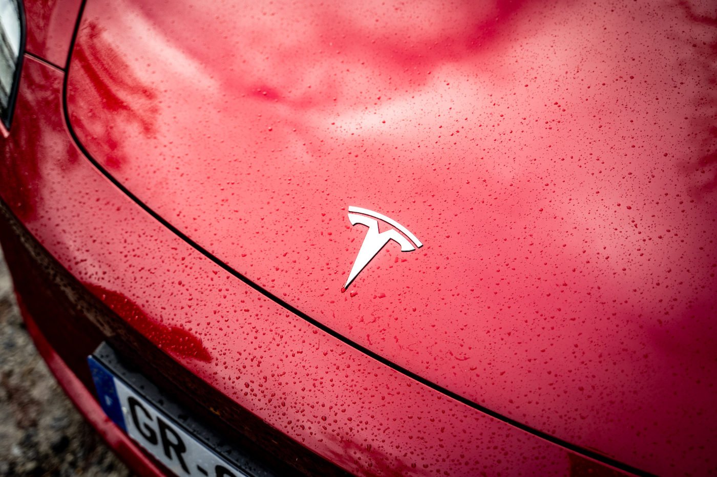 Essai Tesla Model 3 Amelioree Logo